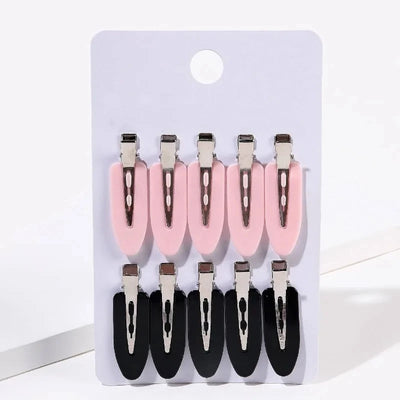 Set of 10 women’s hair clips in pink and black with metal clasps. Stylish and durable hair accessories for securing bangs and casual styling.